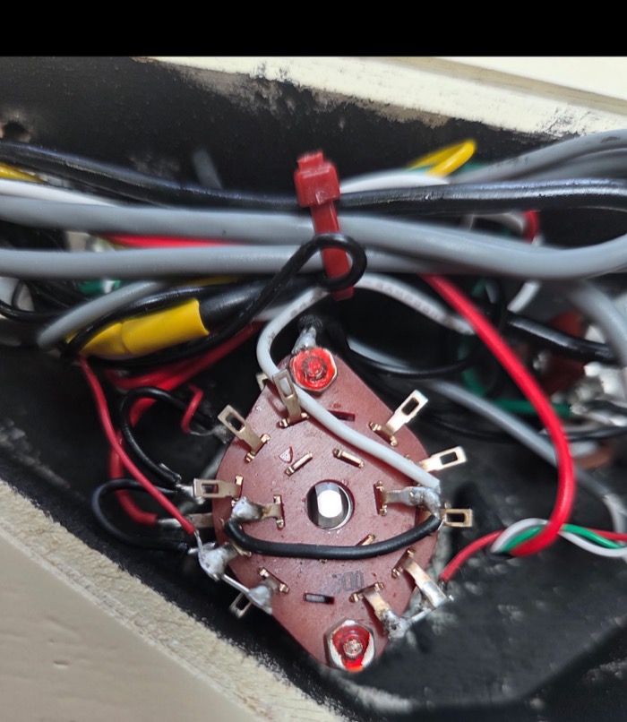 Rotary switch wired into a control cavity