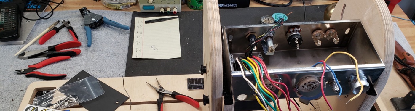 Build in progress with hand tools laid out on the bench
